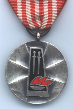Серебряная медаль "За охрану национальных памятников" (аверс)