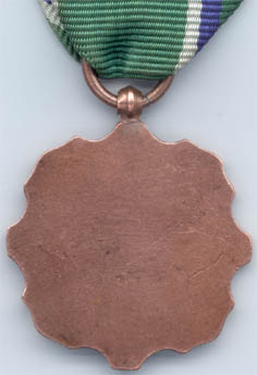 Бронзовая медаль "За заслуги в таможенной службе ПНР" (реверс)